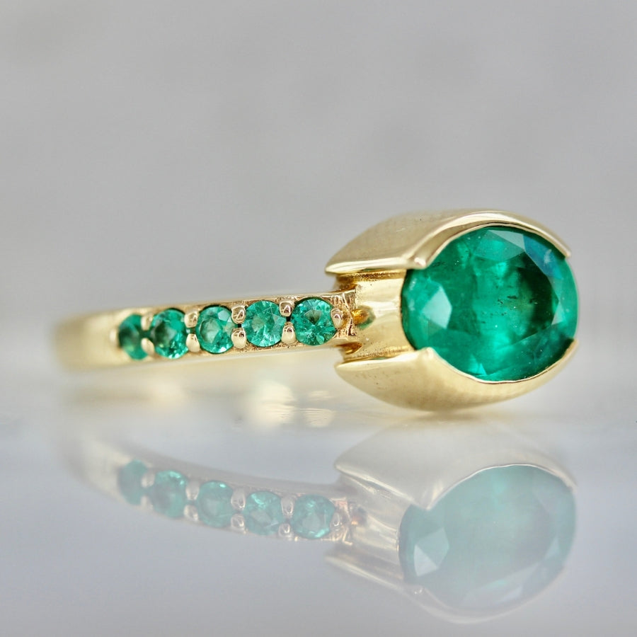 Mare Nubium Oval Cut Emerald Ring