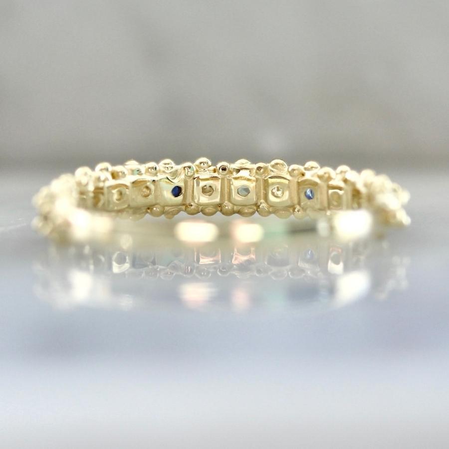 Mastique Round Brilliant Cut Sapphire Band