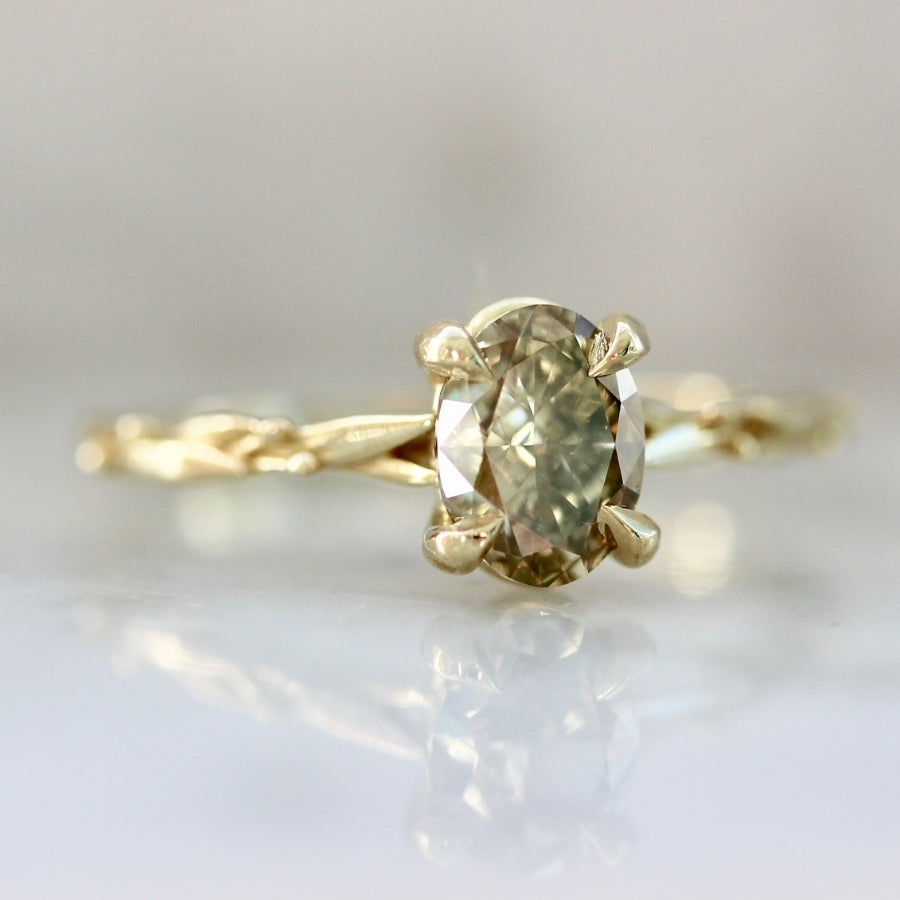 
            Olive Branch Green Oval Cut Diamond Ring