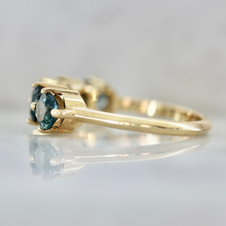 Polaris Teal Round Brilliant Cut Sapphire Band