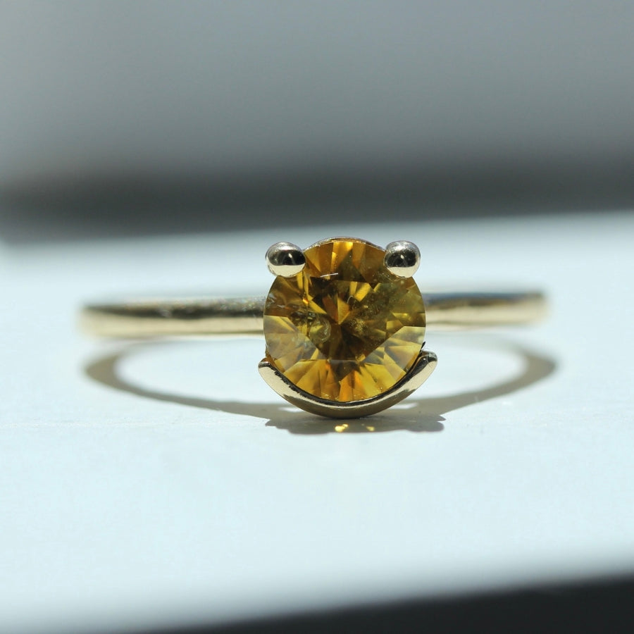 
            Smiley Yellow Round Brilliant Cut Montana Sapphire Ring