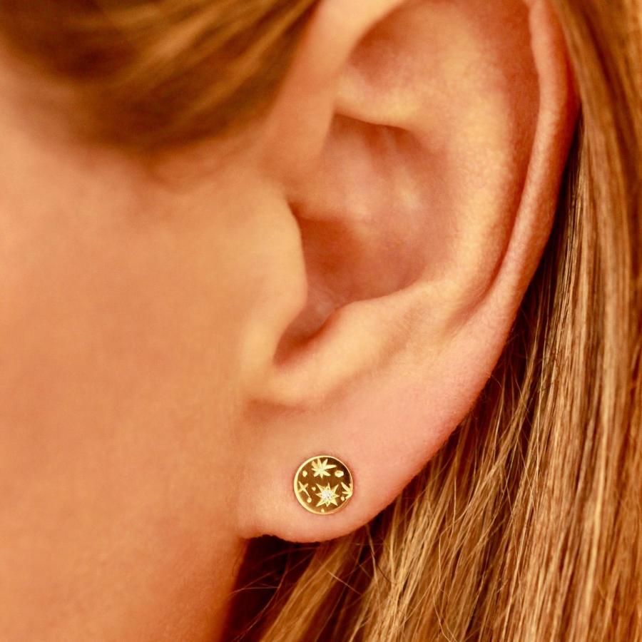 Star engraved gold earrings