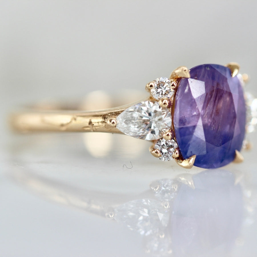Starring Role Purple-Blue Oval Cut Opalescent Sapphire Ring