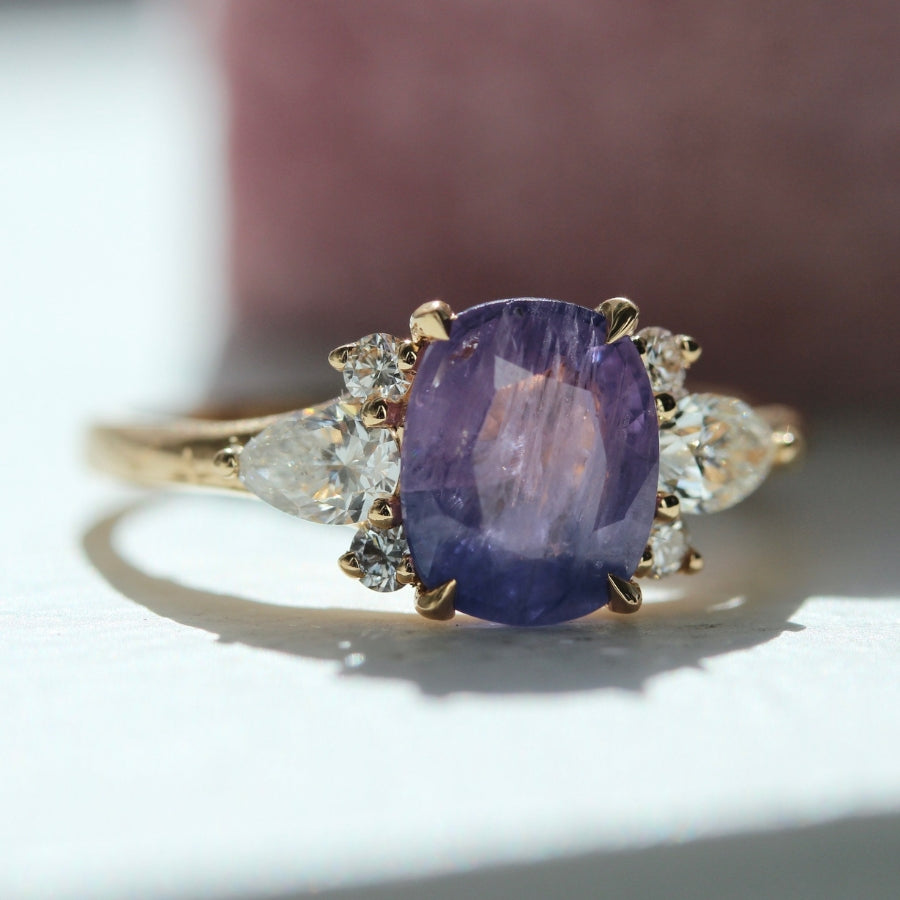 
            Starring Role Purple-Blue Oval Cut Opalescent Sapphire Ring