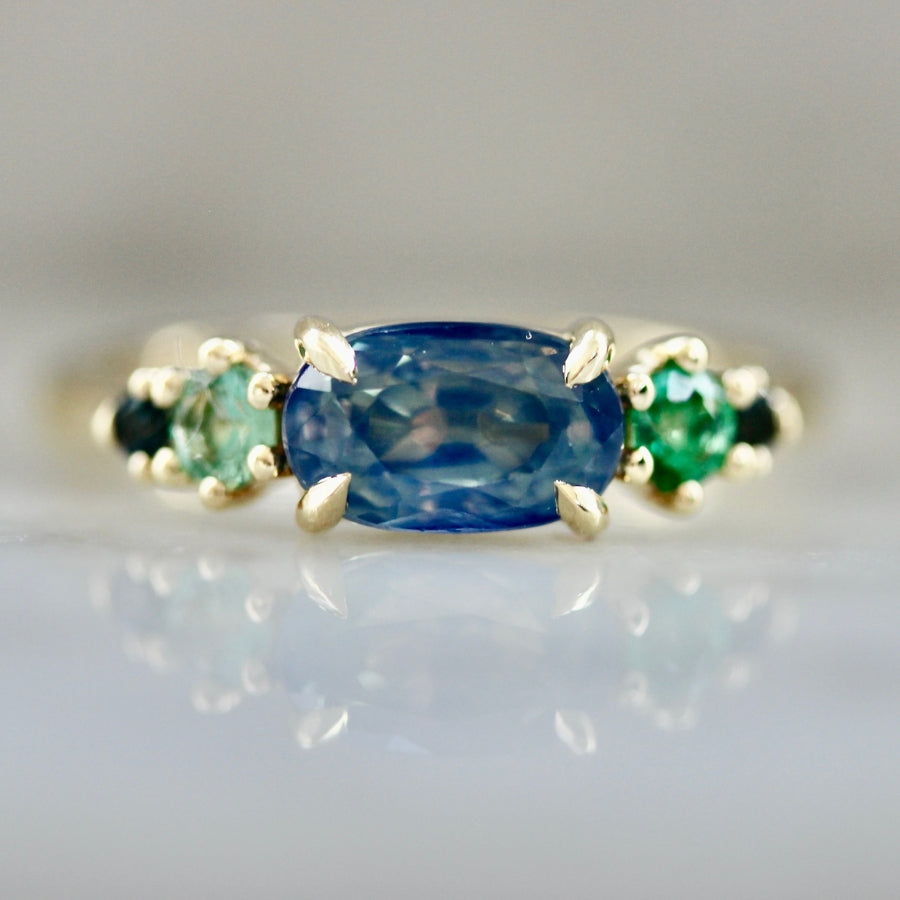 Summer Trifle Blue Oval Cut Sapphire Ring