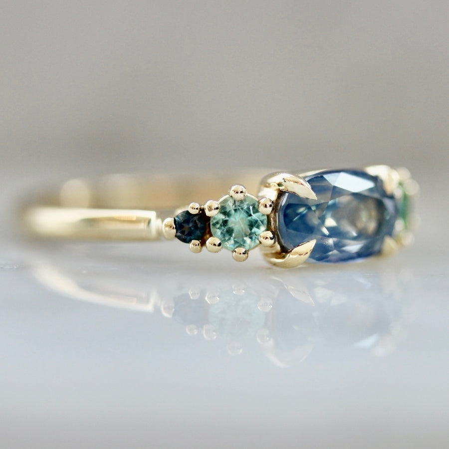 Summer Trifle Blue Oval Cut Sapphire Ring
