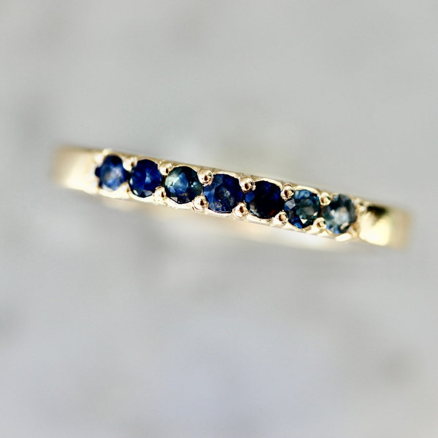 Undertow Blue Round Brilliant Cut Sapphire Band