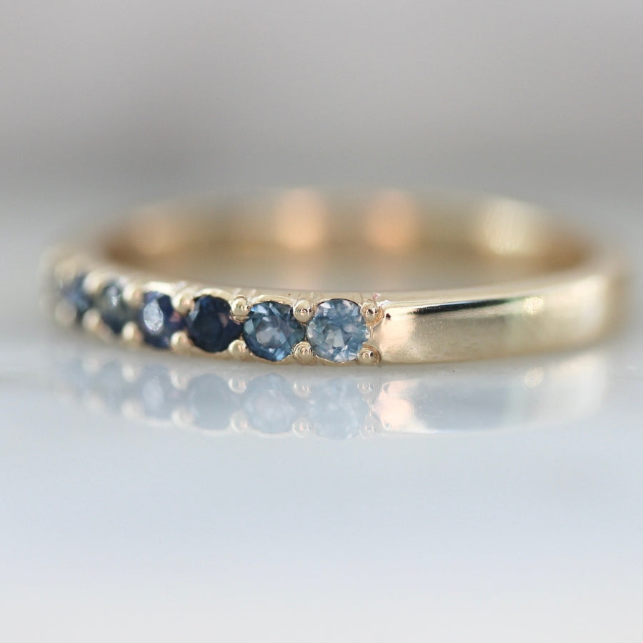 Undertow Blue Round Brilliant Cut Sapphire Band