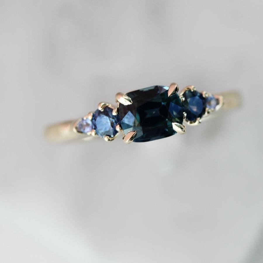 Victory Lap Teal Cushion Cut Sapphire Ring