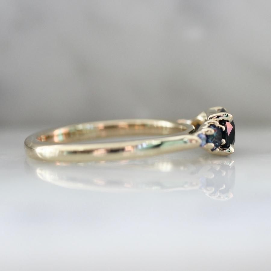 Victory Lap Teal Cushion Cut Sapphire Ring