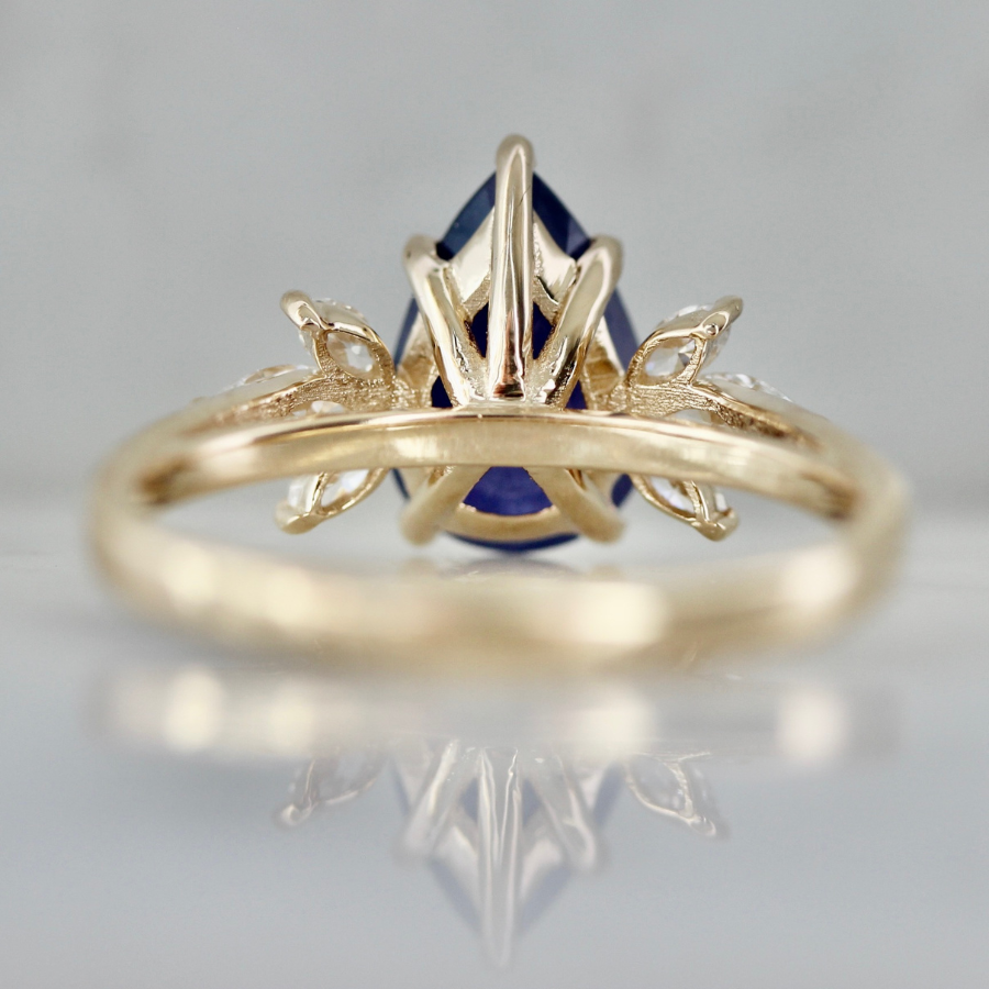 
            Violet Sugar Pear Cut Opalescent Sapphire Cluster Ring