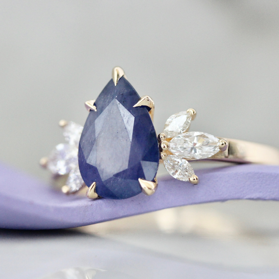 
            Violet Sugar Pear Cut Opalescent Sapphire Cluster Ring