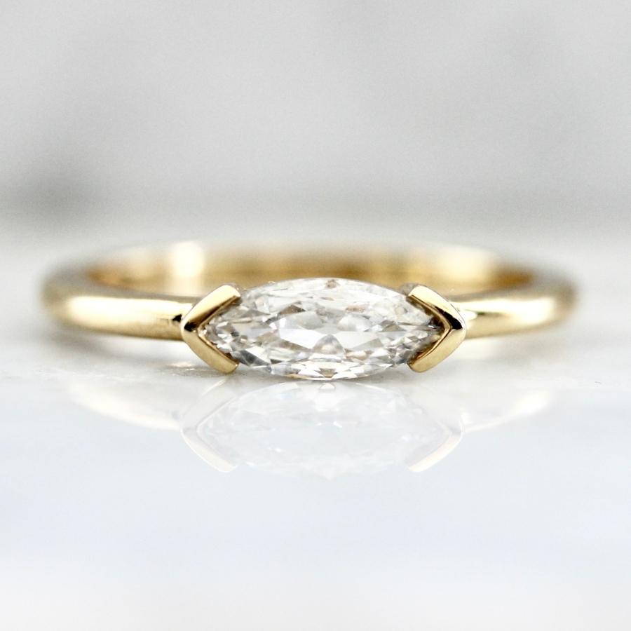 White moval diamond ring