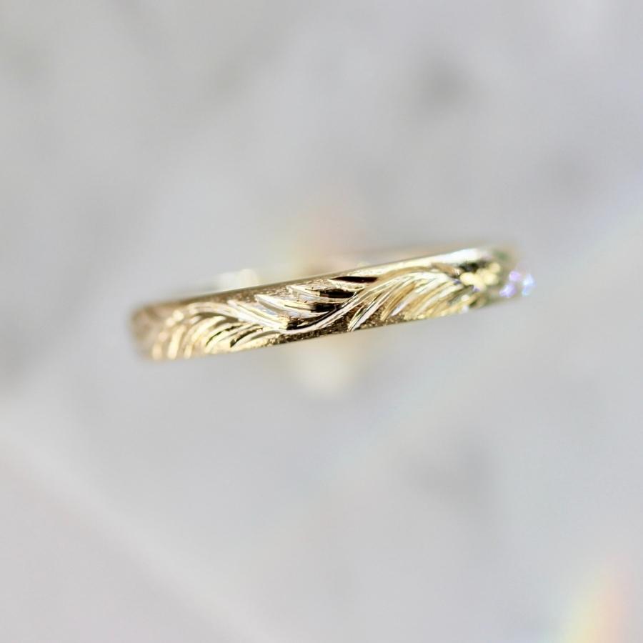 
            feather engraved stacking band