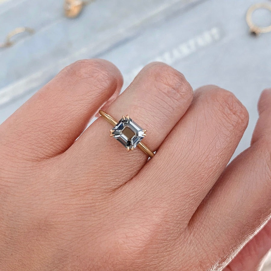 Stella Berry Blue Emerald Cut Spinel in Peach Gold