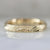 wavy engraved gold band